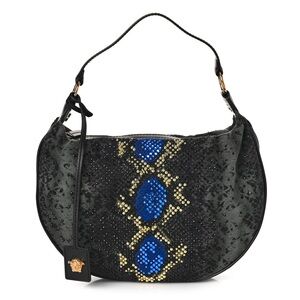 Versace denim snake print hobo bag.
